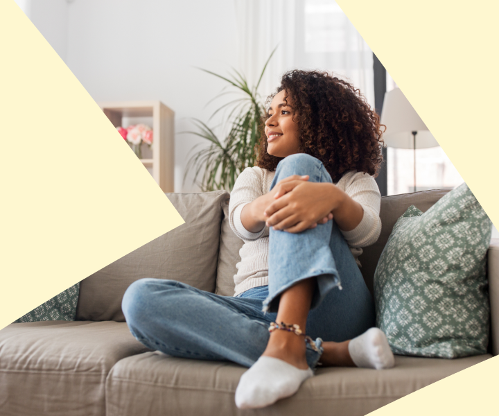 A person sitting on a couch.
