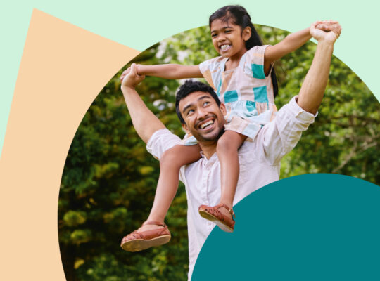 A person and a child are in a pose.